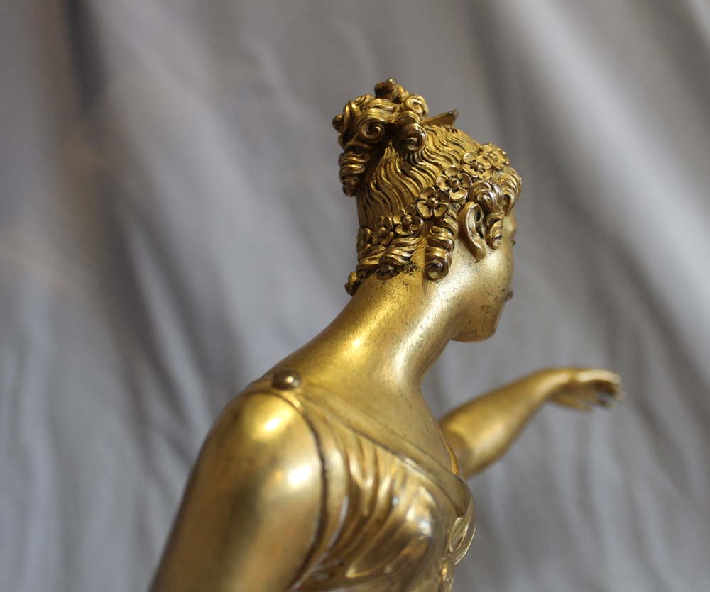 Antique French Louis XVI ormolu statue of a woman on Blue Tarquin ormolu mounted marble base.