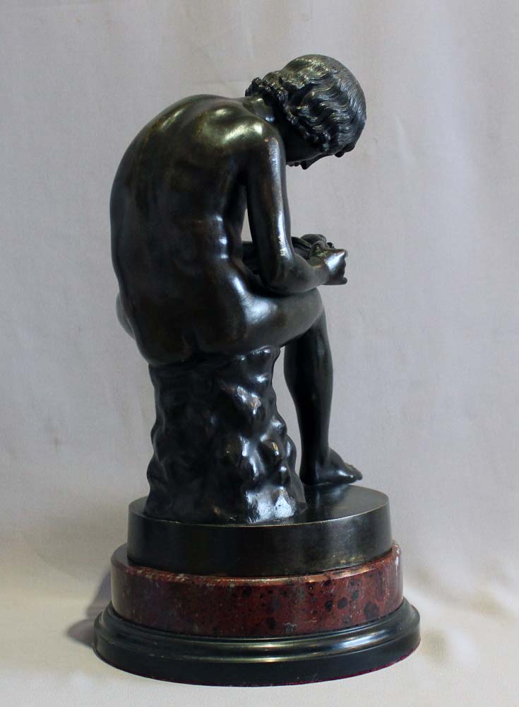 Antique Italian Grand Tour bronze of the Spinario on rouge marble base.