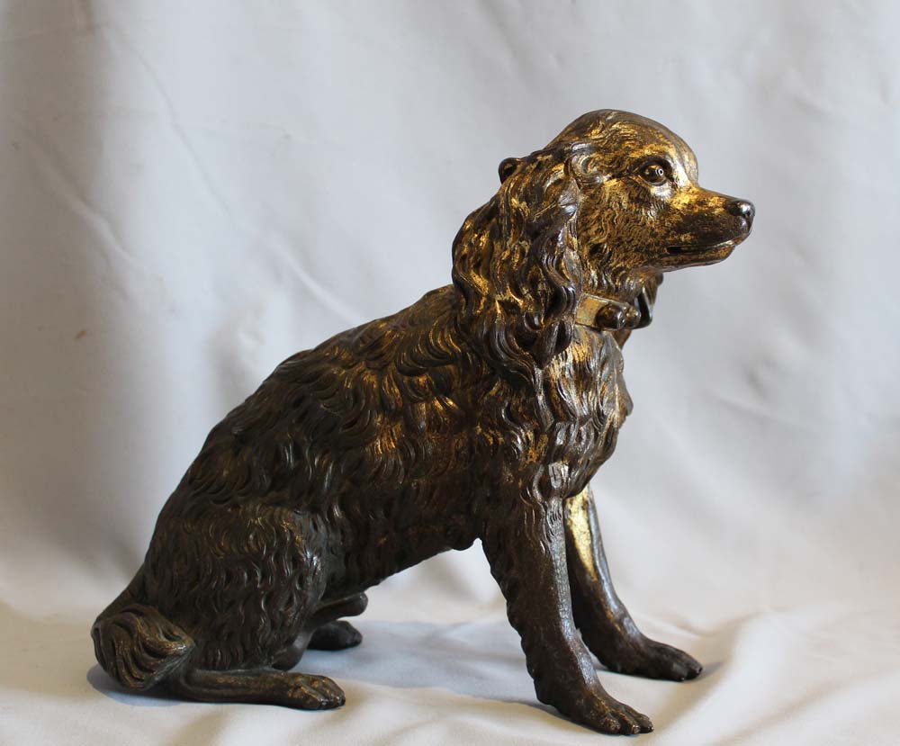 Antique large English Regency gilt bronze model of a King Charles Spaniel.