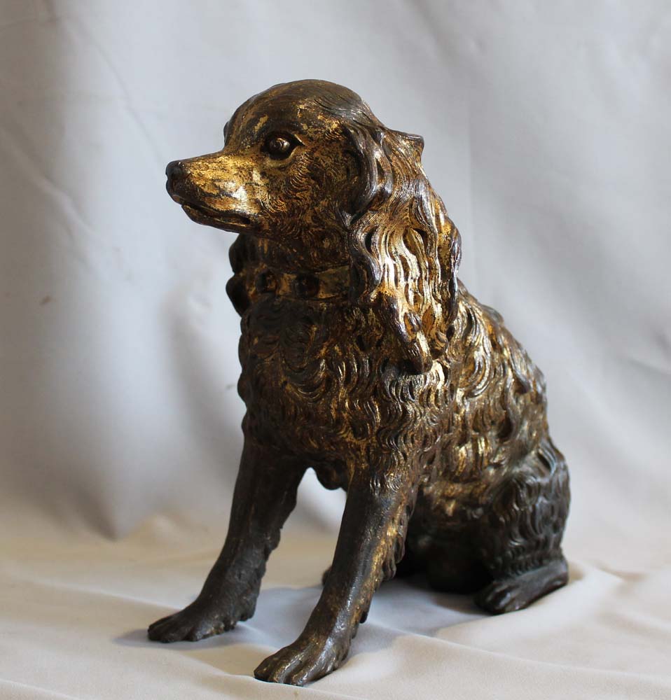 Antique large English Regency gilt bronze model of a King Charles Spaniel.