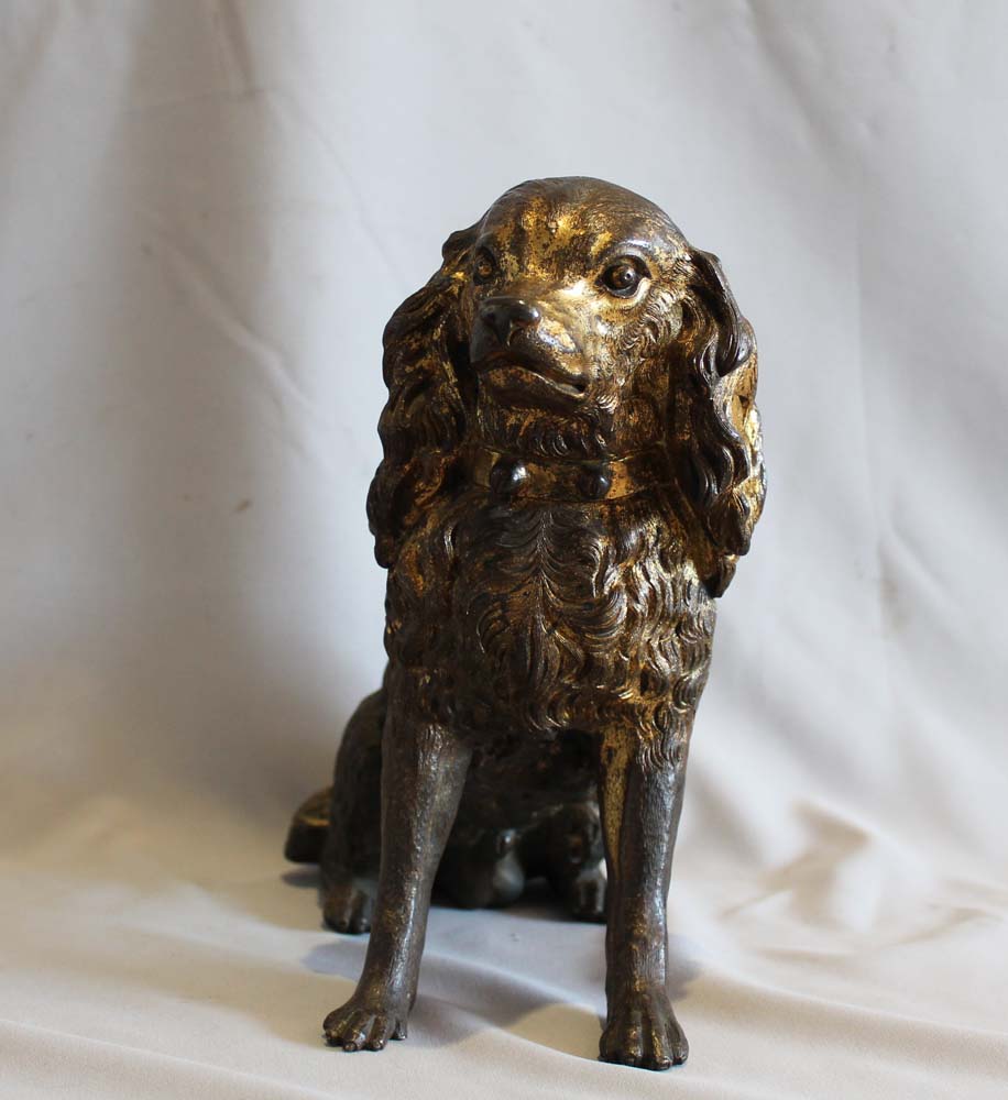 Antique large English Regency gilt bronze model of a King Charles Spaniel.