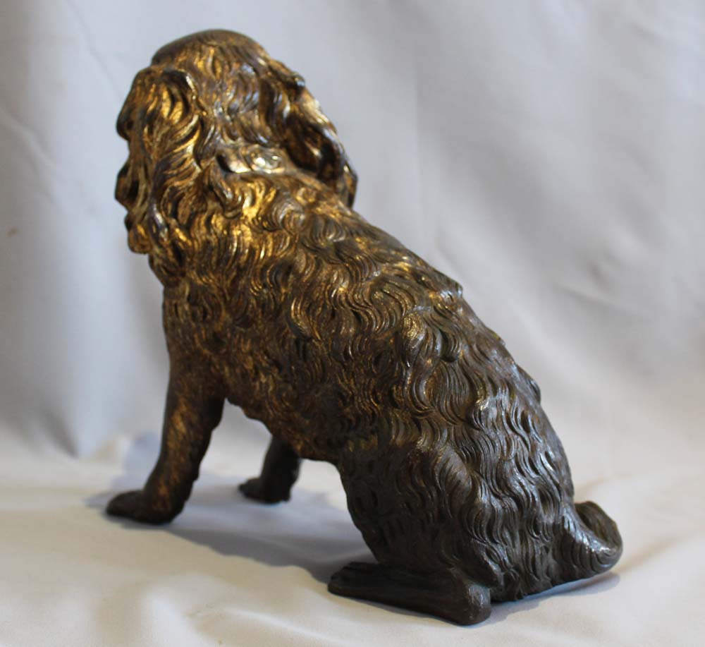 Antique large English Regency gilt bronze model of a King Charles Spaniel.