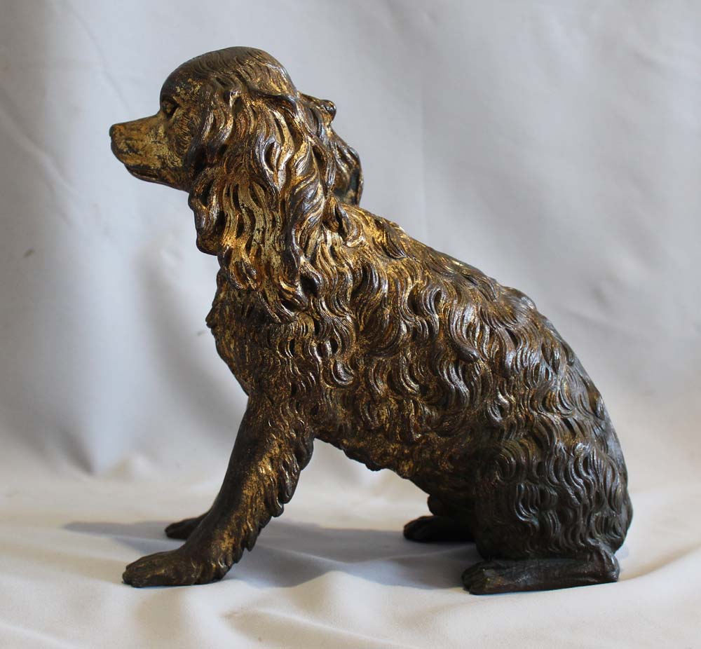 Antique large English Regency gilt bronze model of a King Charles Spaniel.