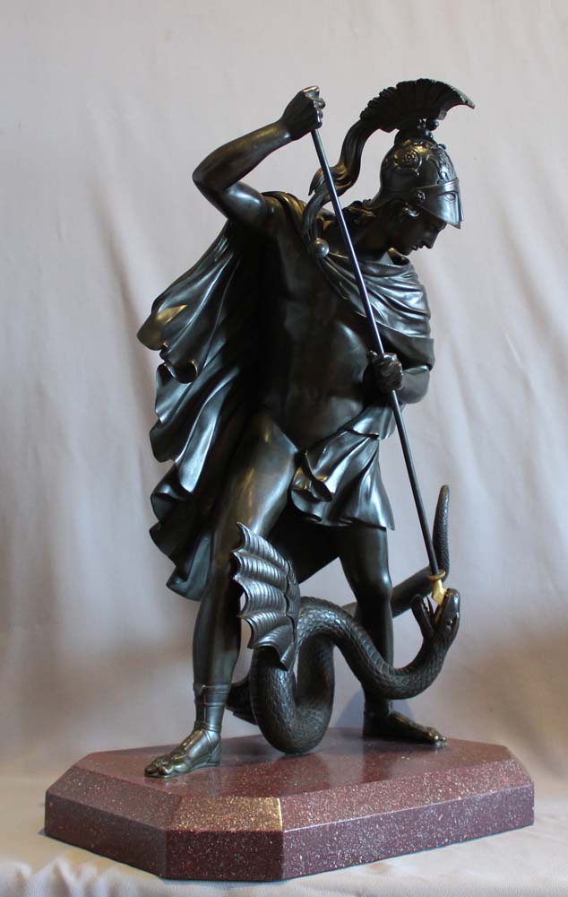 Antique bronze of Jason fighting the dragon for the golden fleece.