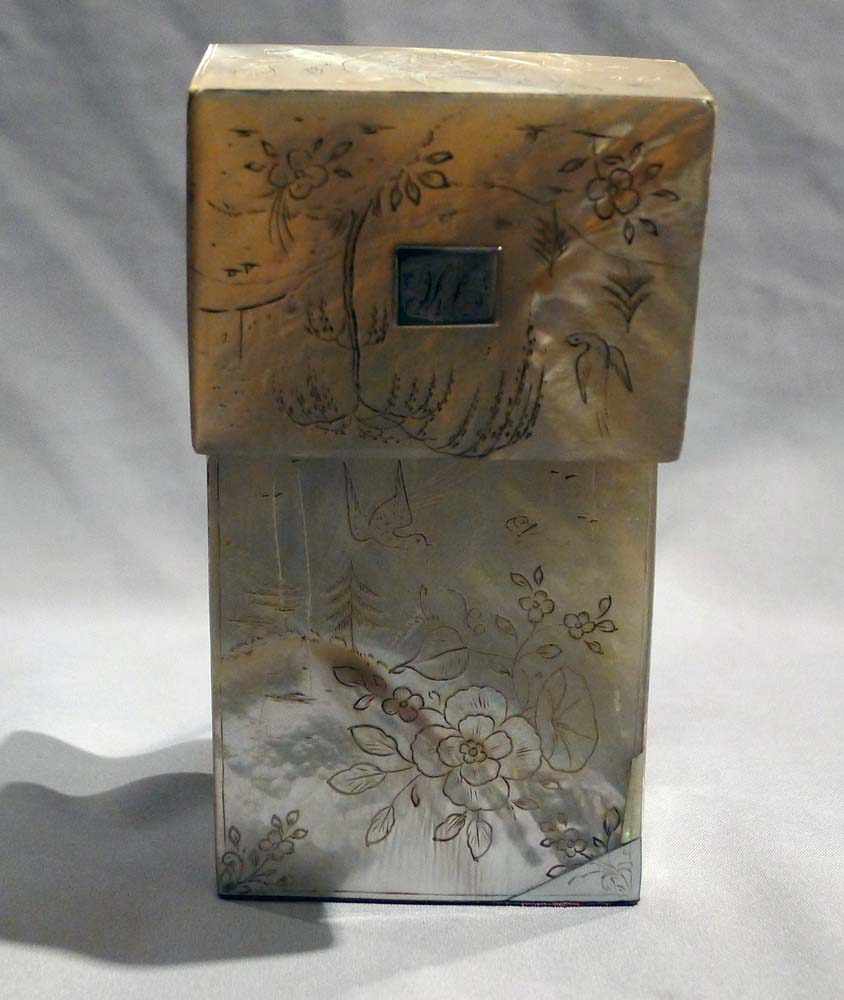 Antique engraved mother of pearl etui lined with ivory and silver mounted
