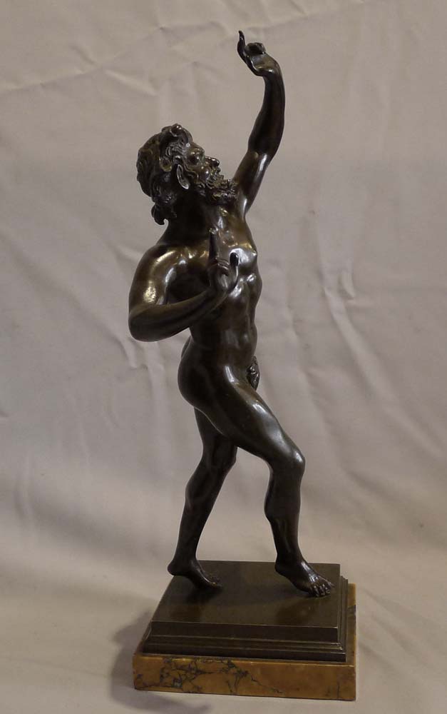 Antique Italian figure of the Dancing faun on Sienna marble base.