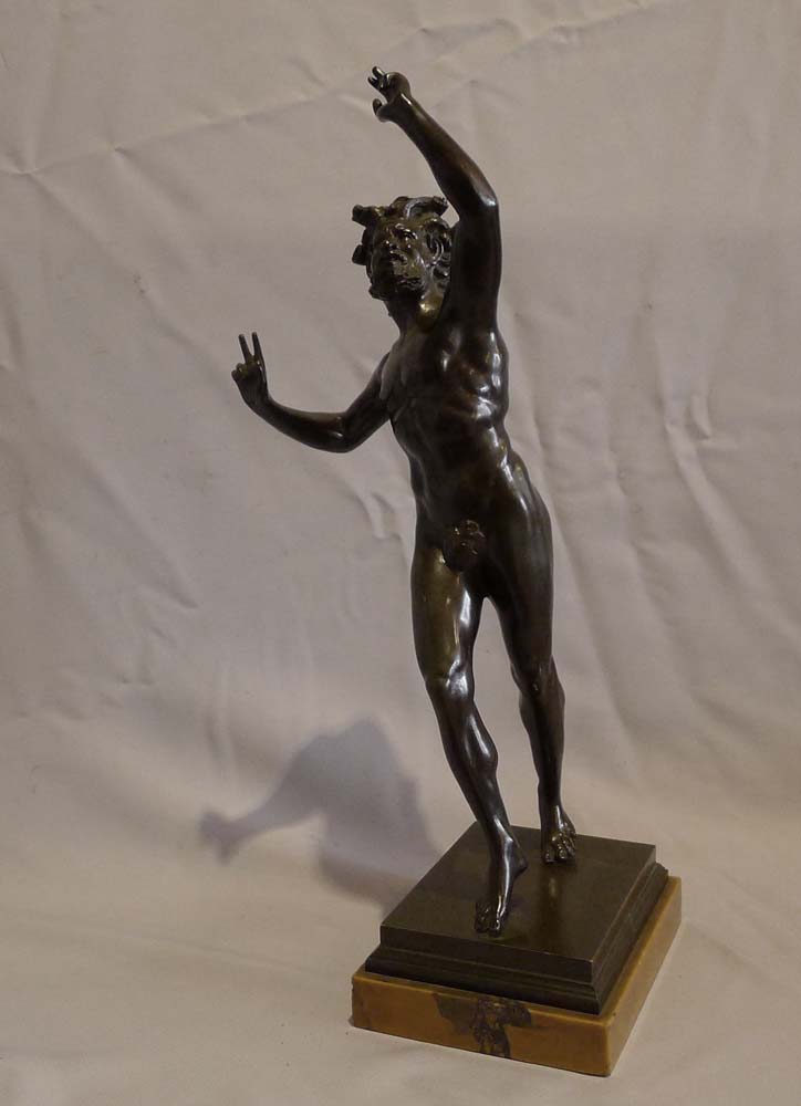 Antique Italian figure of the Dancing faun on Sienna marble base.