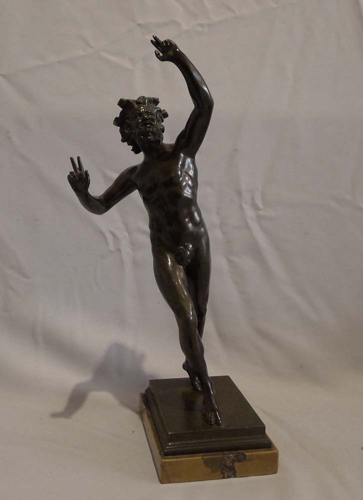 Antique Italian figure of the Dancing faun on Sienna marble base.