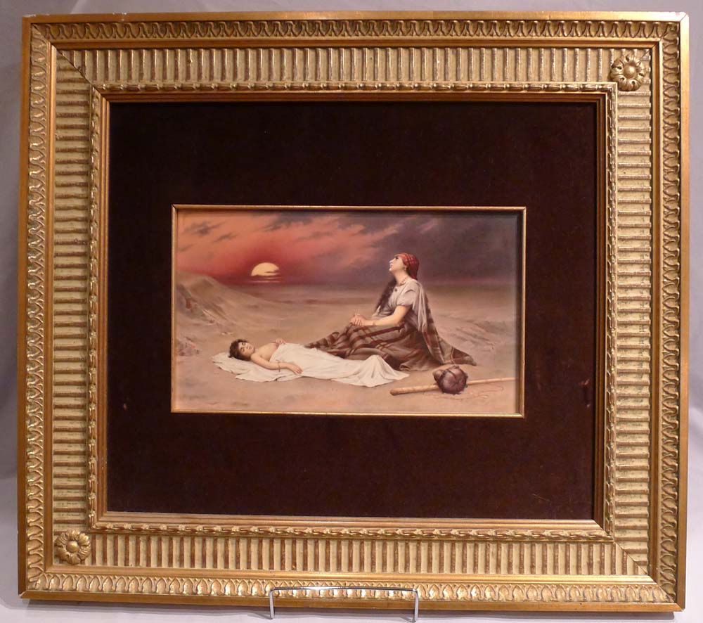 Antique KPM plaque of desert scene and the story of Ishmael in gilt frame.