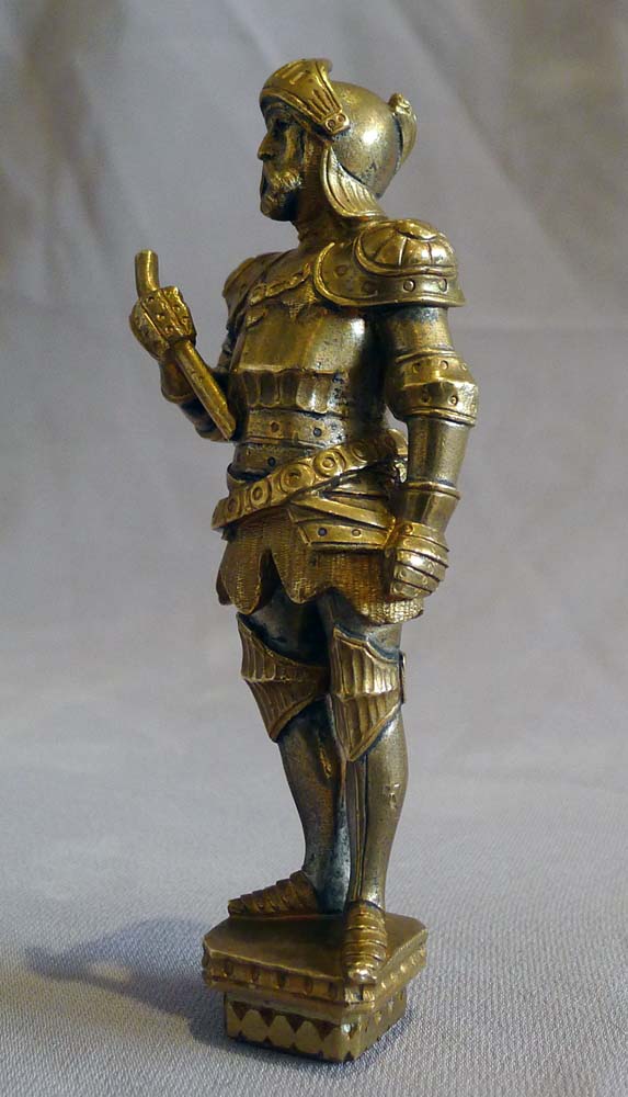 Antique seal in the form of a standing knight in full armour.
