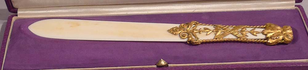 Antique ivory and gilt bronze letter opener in original case
