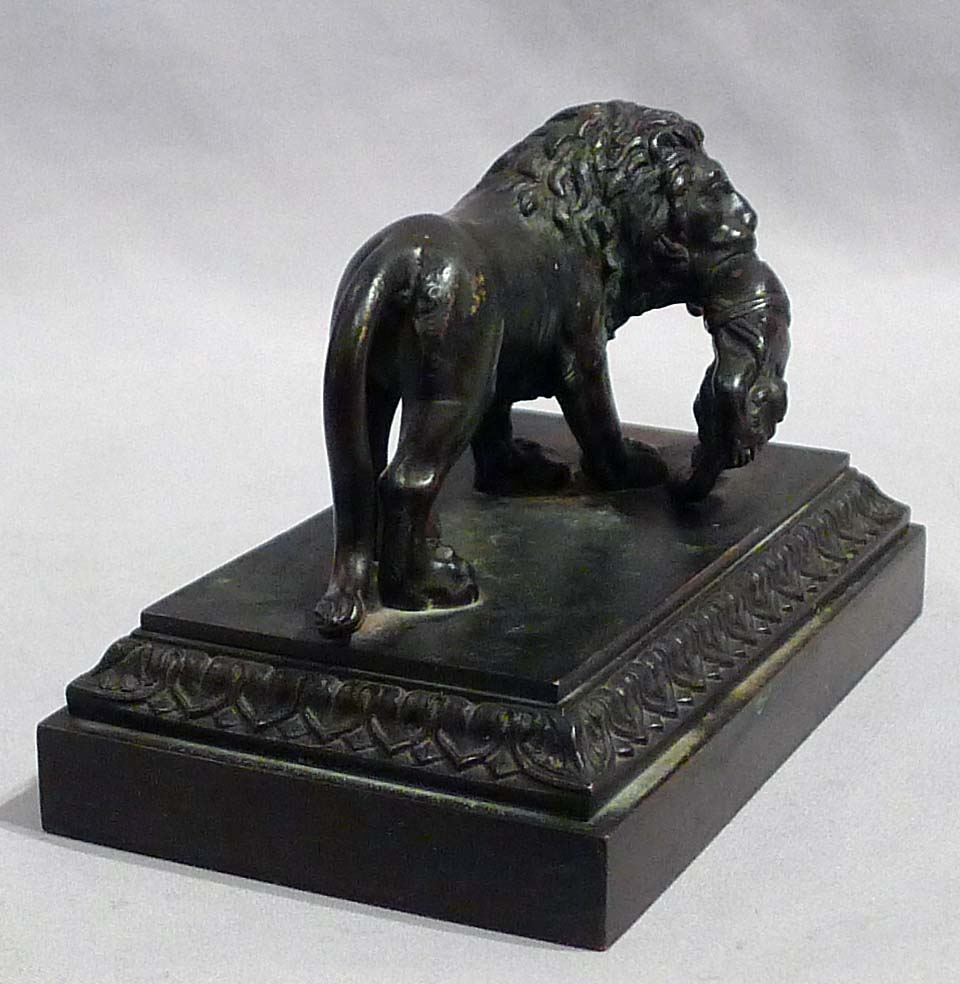 Antique English Regency bronze of Lion with child.