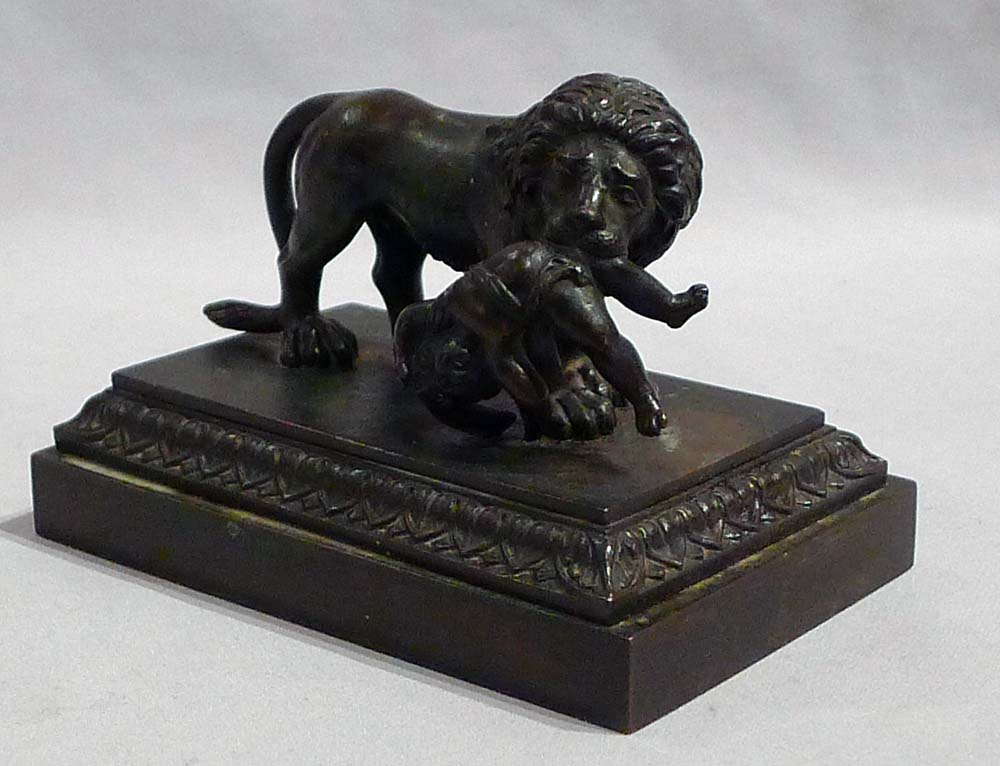 Antique English Regency bronze of Lion with child.