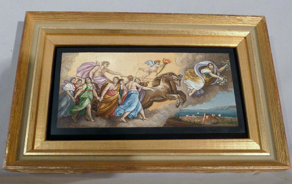 Fine antique Italian mosaic on to black marble in giltwood frame.
