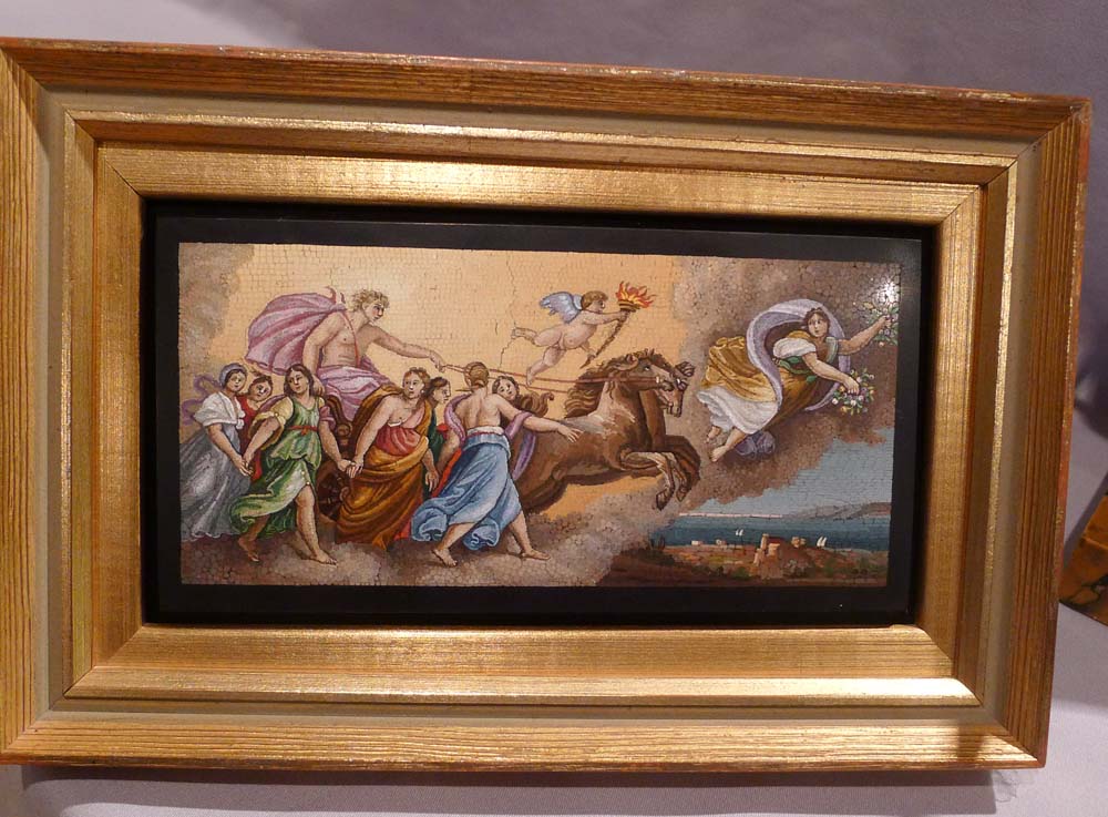 Fine antique Italian mosaic on to black marble in giltwood frame.
