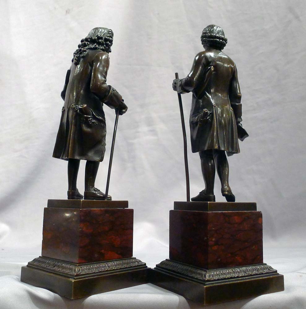 Antique pair of unusually fine bronzes of Rousseau and Voltaire