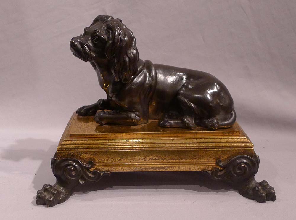 Antique French bronze of dog on ormolu base in manner of Caffieri.