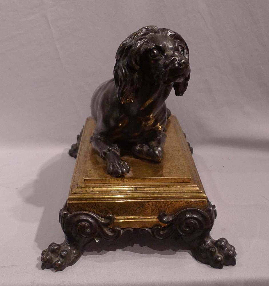 Antique French bronze of dog on ormolu base in manner of Caffieri.