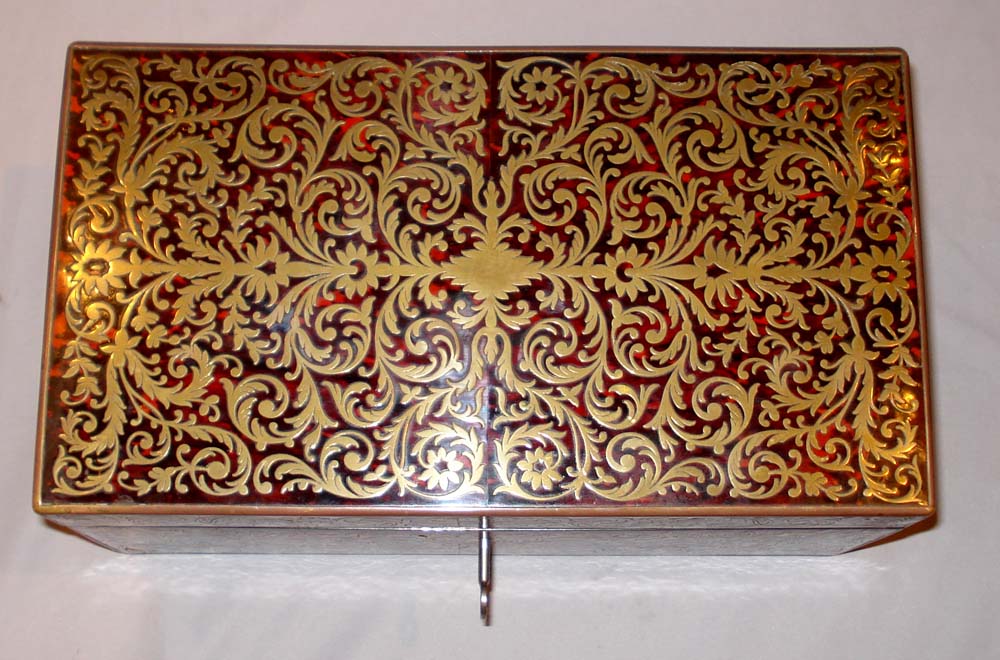 Antique English boulle casket ( red tortoiseshell and inlaid brass).