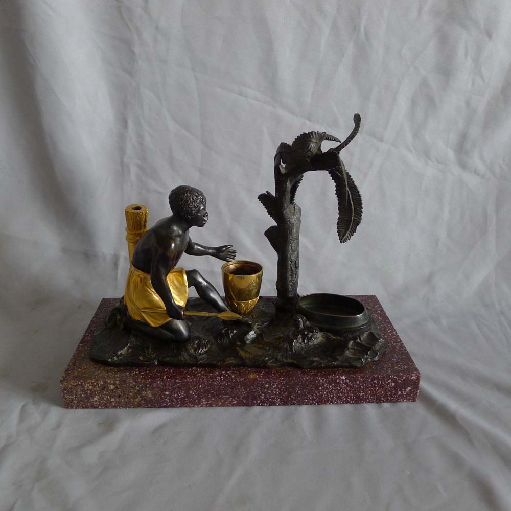 Antique French Directoire gilt and patinated bronze mounted ecrier of blackamoor.