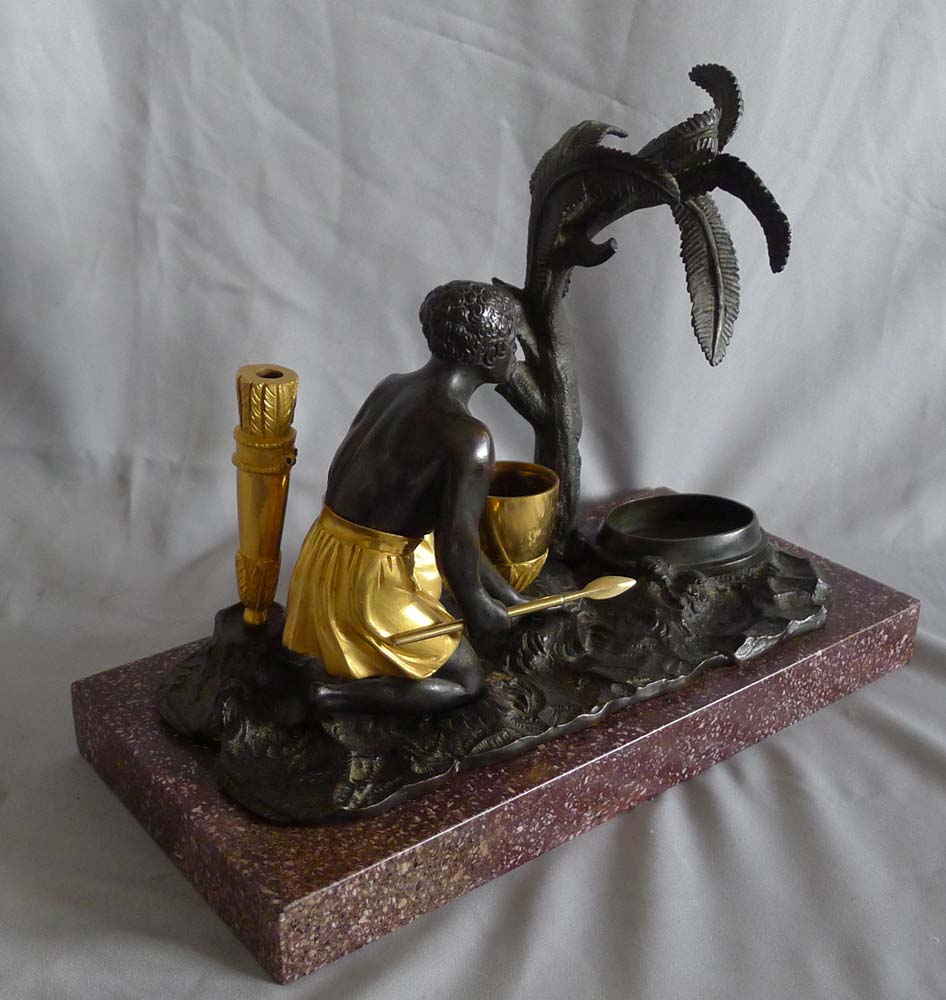 Antique French Directoire gilt and patinated bronze mounted ecrier of blackamoor.
