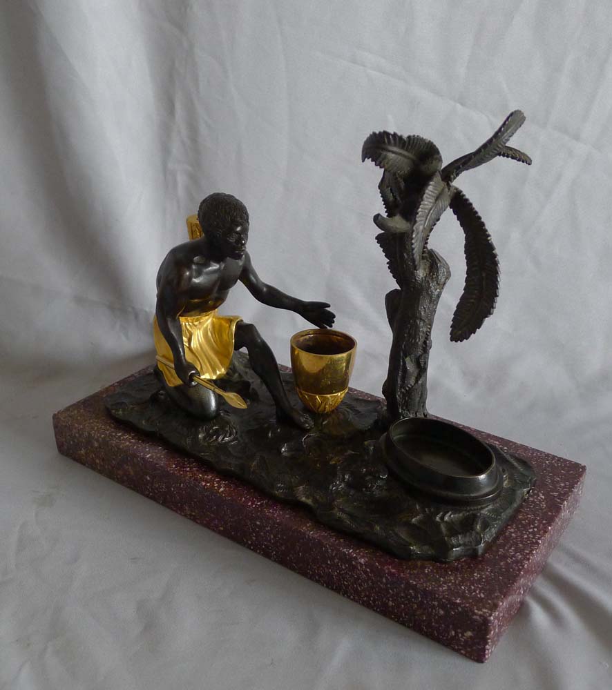 Antique French Directoire gilt and patinated bronze mounted ecrier of blackamoor.