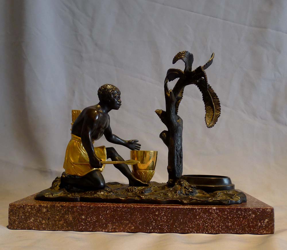 Antique French Directoire gilt and patinated bronze mounted ecrier of blackamoor.