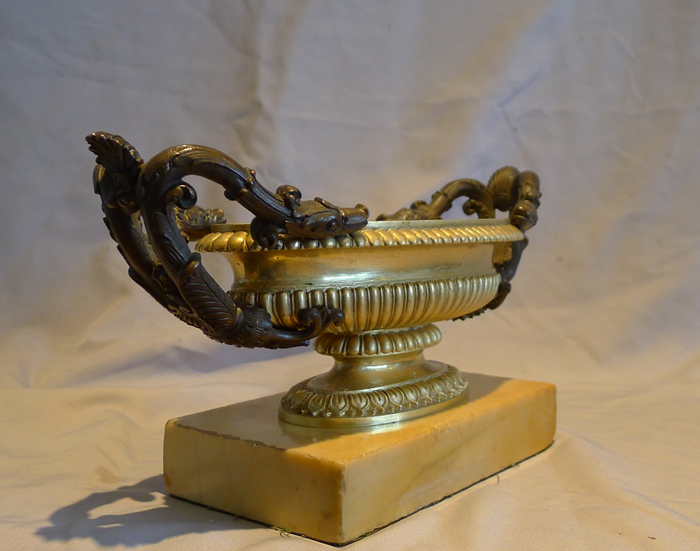 Antique Italian Grand Tour pair of patinated and gilt bronze tazza set on a Sienna marble base.