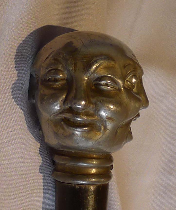 Antique page turner ebonizes and silvered with four faces.