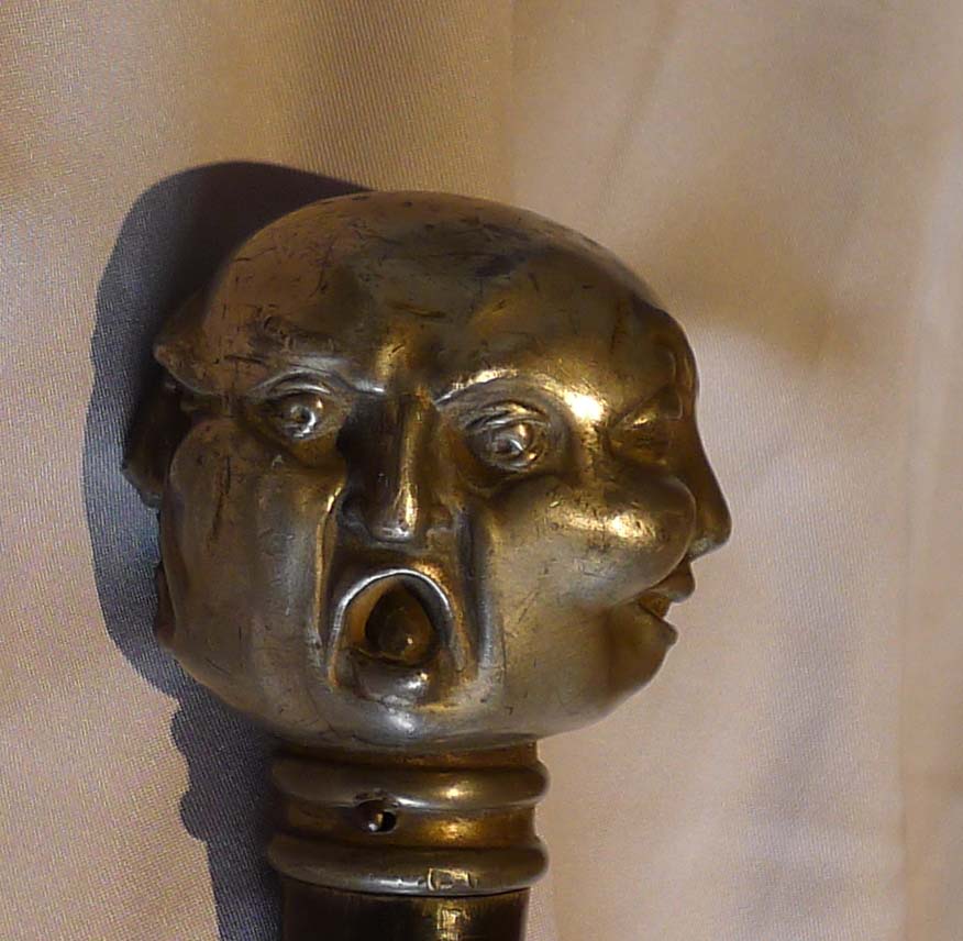 Antique page turner ebonizes and silvered with four faces.