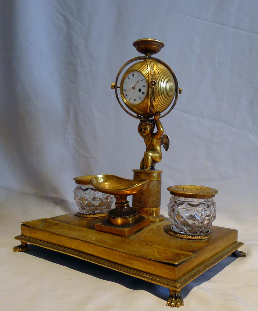 English Regency ormolu inkstand with watch movement circa 1815.