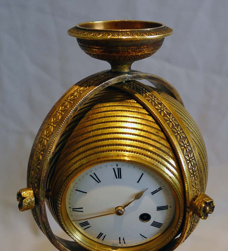 English Regency ormolu inkstand with watch movement circa 1815.