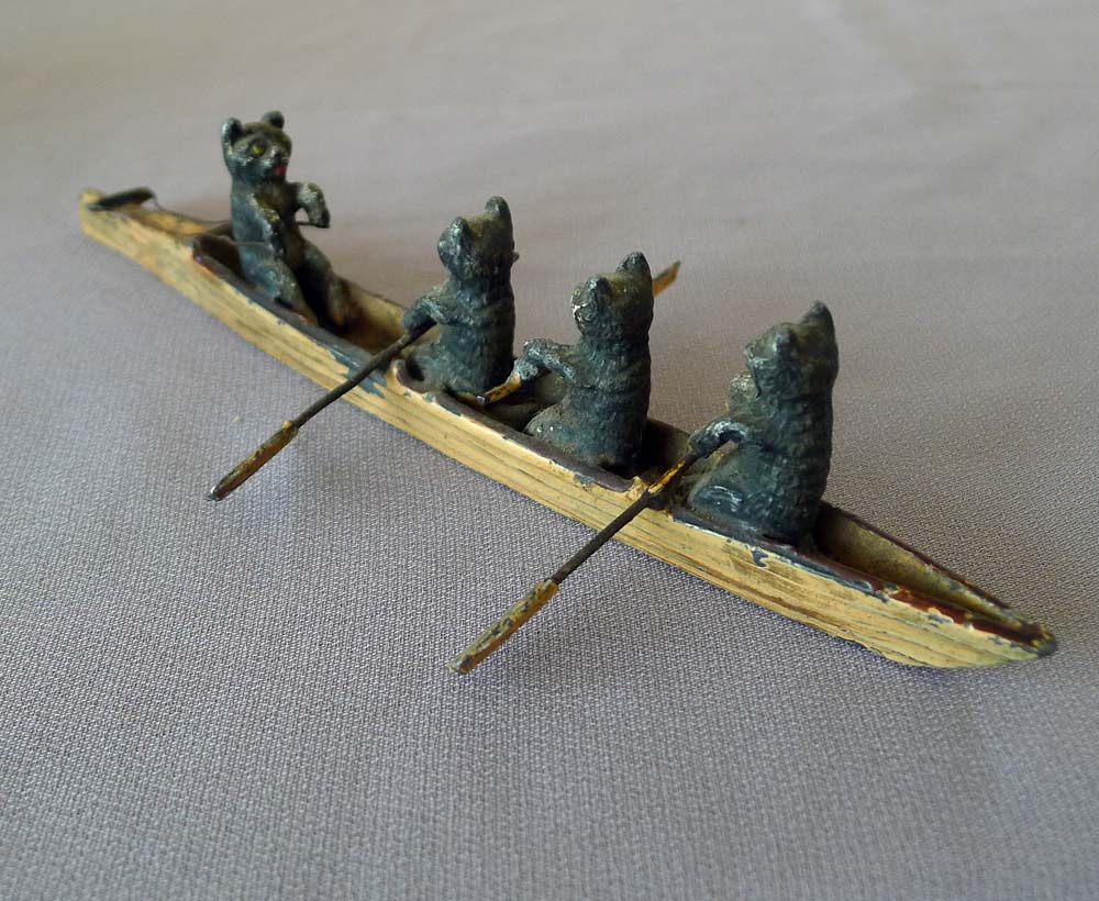 Antique cold painted Austrian bronze of four cats in a rowing skiff.