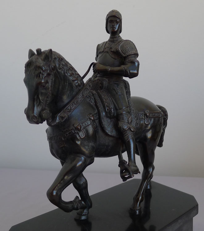 Antique bronze of Italian Rennaissance General  Bartolomeo Colleoni on his warhorse on marble stand.