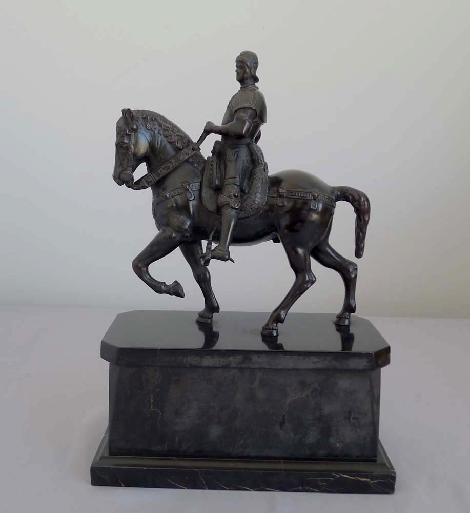 Antique bronze of Italian Rennaissance General  Bartolomeo Colleoni on his warhorse on marble stand.
