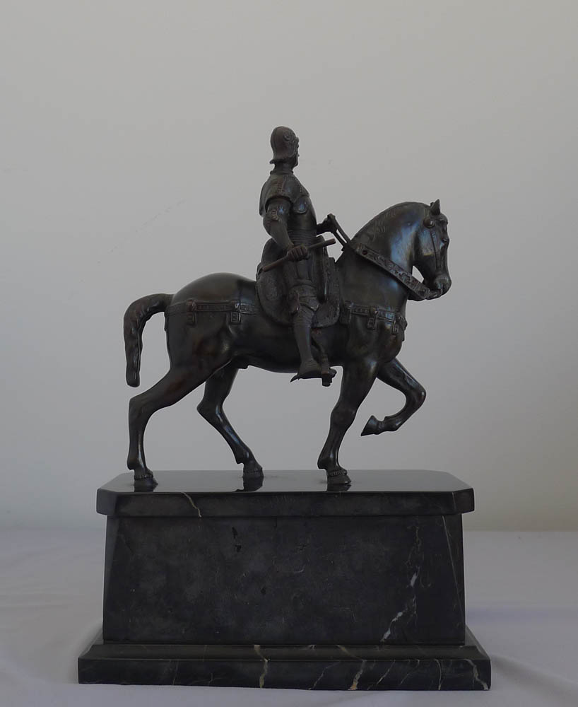 Antique bronze of Italian Rennaissance General  Bartolomeo Colleoni on his warhorse on marble stand.