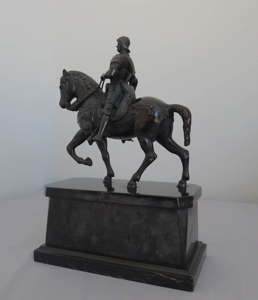 Antique bronze of Italian Rennaissance General  Bartolomeo Colleoni on his warhorse on marble stand.