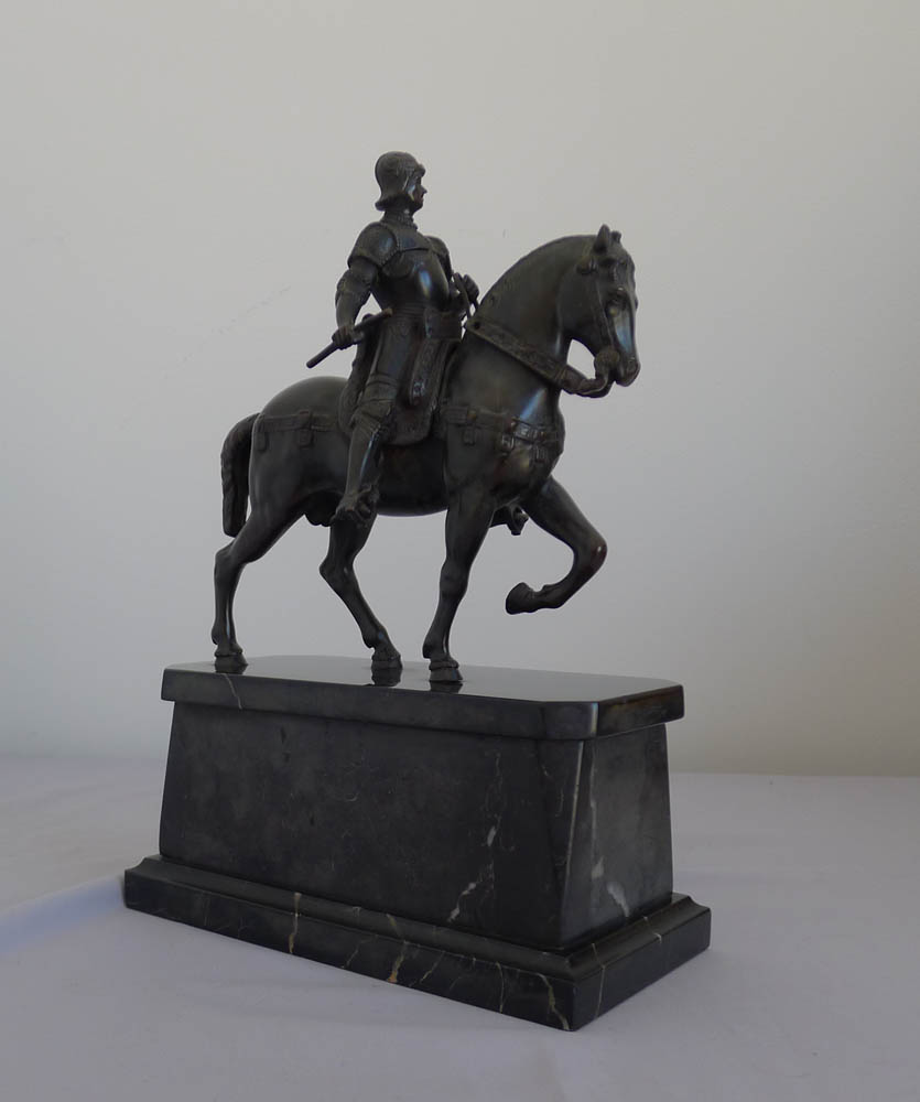 Antique bronze of Italian Rennaissance General  Bartolomeo Colleoni on his warhorse on marble stand.