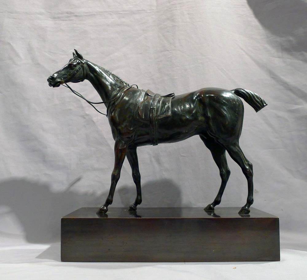 Antique French Charles X period patinated bronze of a Racehorse on rectangular bronze base.