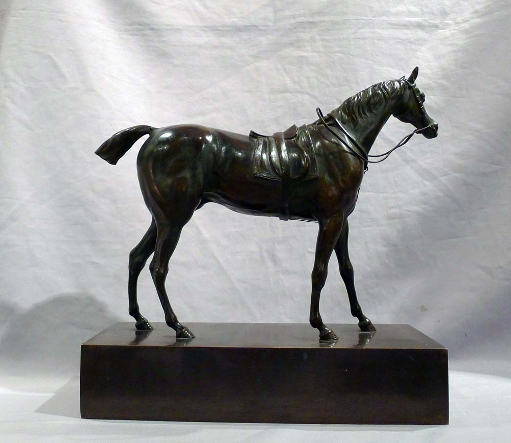 Antique French Charles X period patinated bronze of a Racehorse on rectangular bronze base.