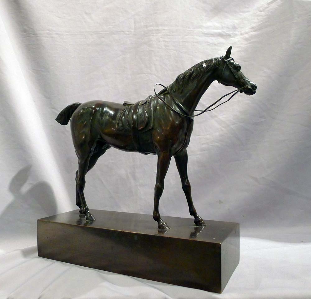 Antique French Charles X period patinated bronze of a Racehorse on rectangular bronze base.