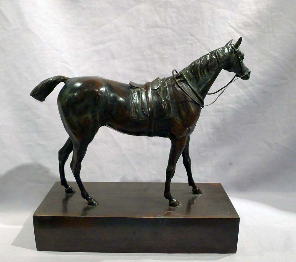 Antique French Charles X period patinated bronze of a Racehorse on rectangular bronze base.