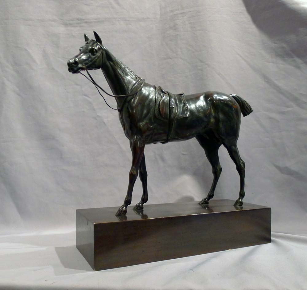 Antique French Charles X period patinated bronze of a Racehorse on rectangular bronze base.