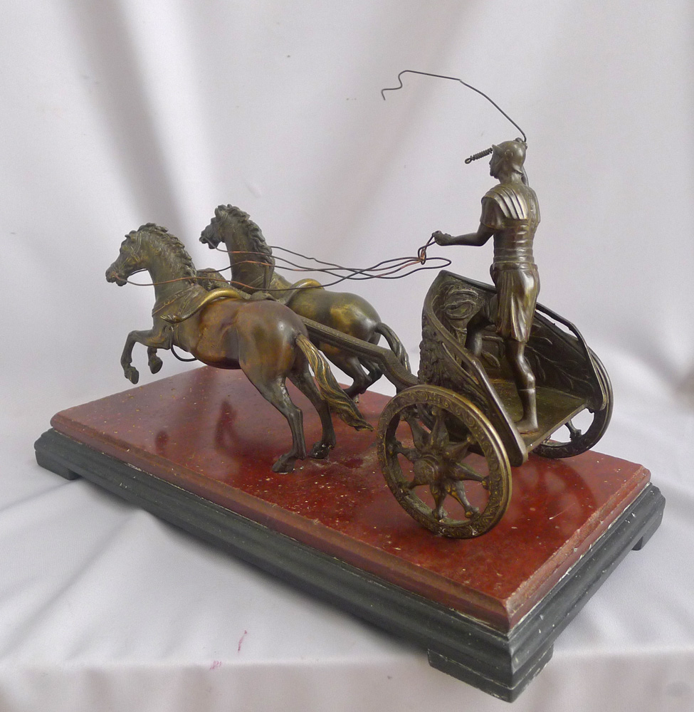 Antique Grand Tour bronze of Charioteer on rouge and black marble base