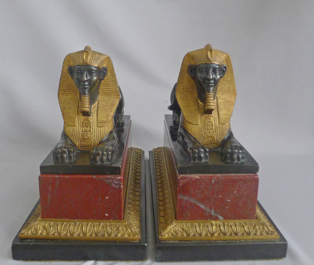 Antique Pair of Grand Tour Sphinxs in Ormolu, patinated bronze and Red and black marble