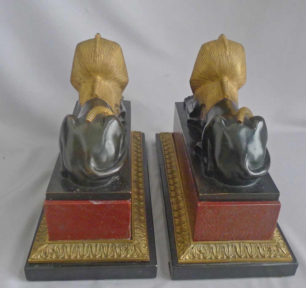 Antique Pair of Grand Tour Sphinxs in Ormolu, patinated bronze and Red and black marble