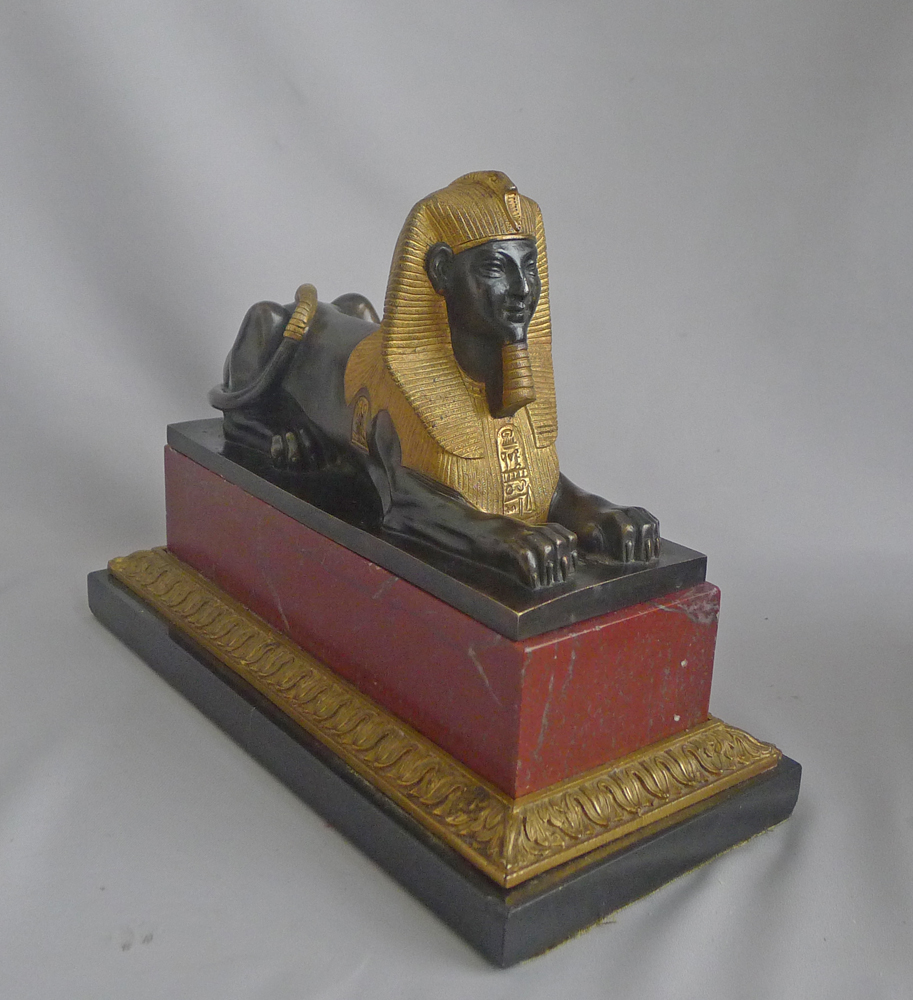 Antique Pair of Grand Tour Sphinxs in Ormolu, patinated bronze and Red and black marble