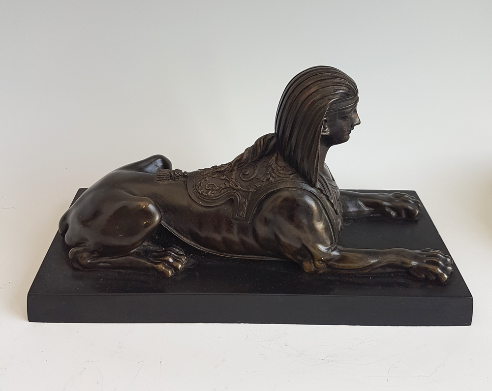 English Regency Egyptian revival Sphinx on black marble base.