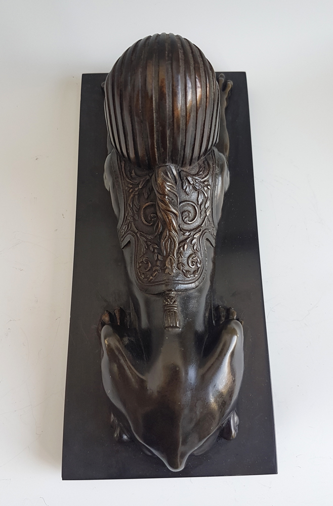 English Regency Egyptian revival Sphinx on black marble base.