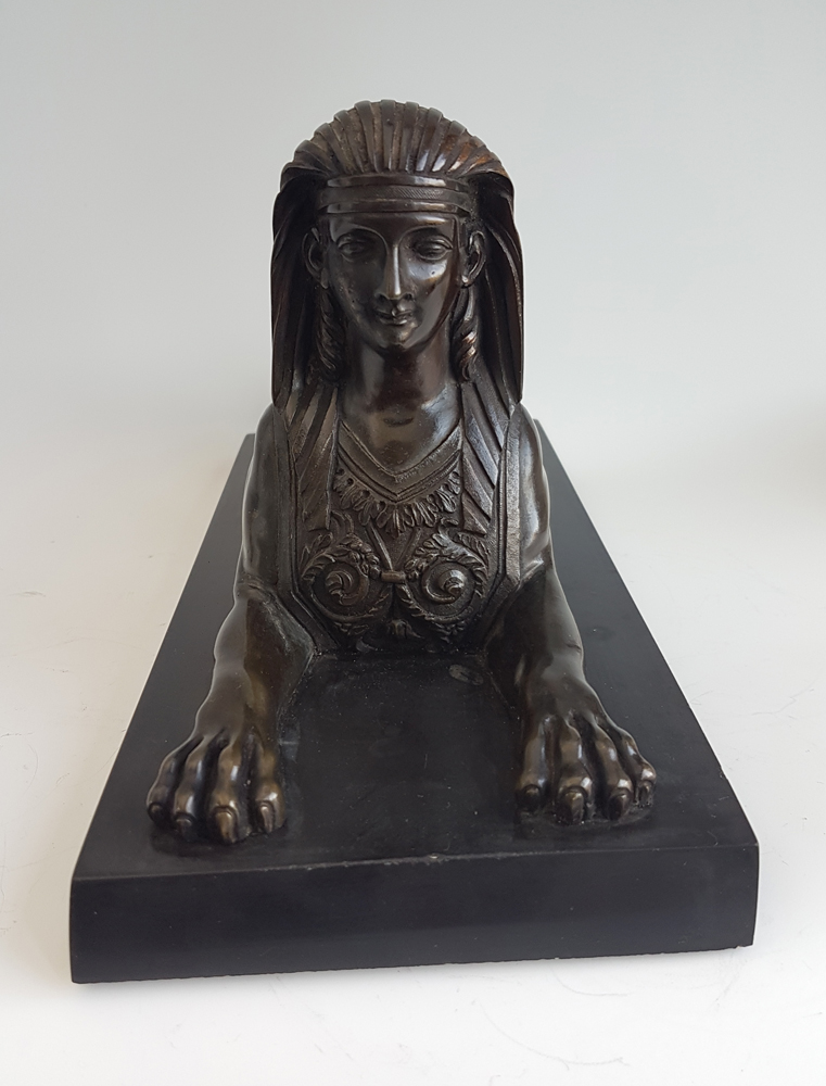 English Regency Egyptian revival Sphinx on black marble base.